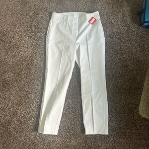 A pair of white Spanx dress pants perfect for any occasion!